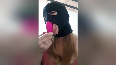 Masked Girl Sucking Her Sex Toys